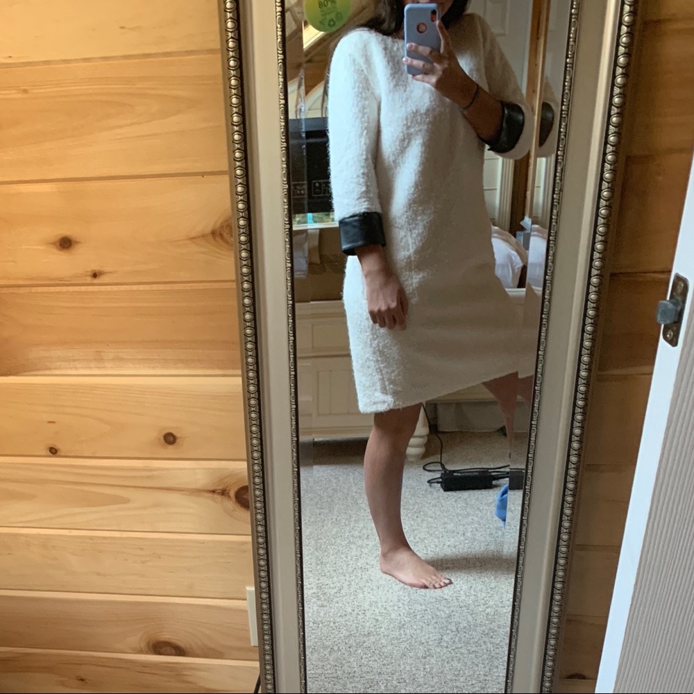 Worth-White fuzzy dress with Black leather cuffs
